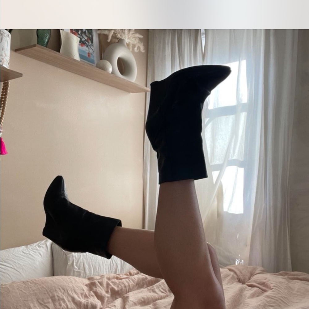 Sleek Black Ankle Booties with Pointed Toe and Curved Heel